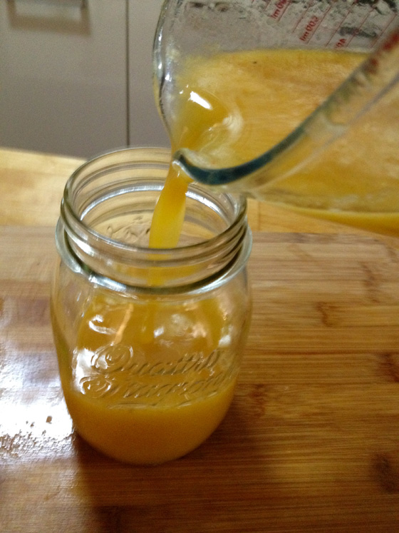 Pouring spicy orange juice