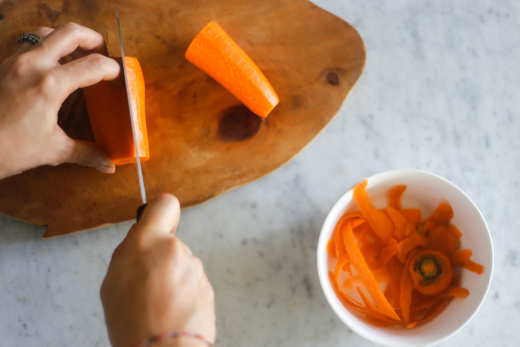 4. Cut the pieces into even slices | How to Bâtonnet a Carrot