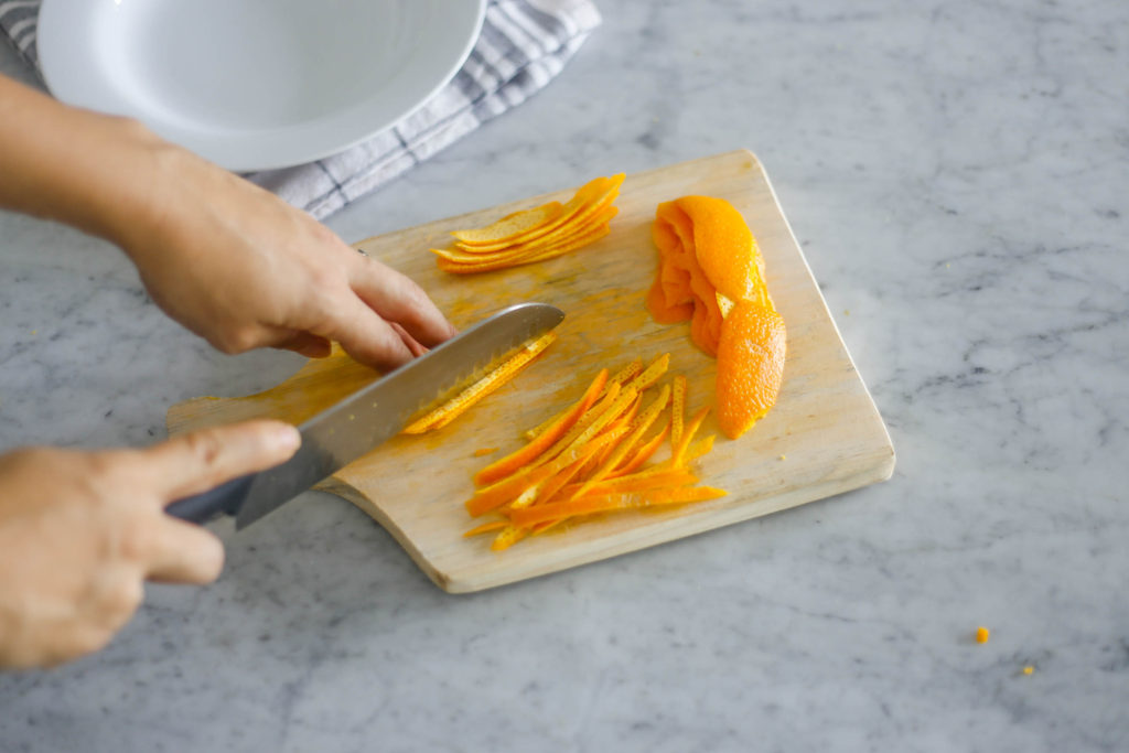 Cut orange peel into strips or large pieces