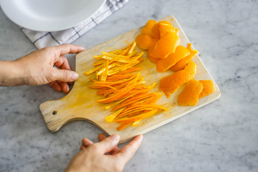 Cut orange peel into strips or large pieces