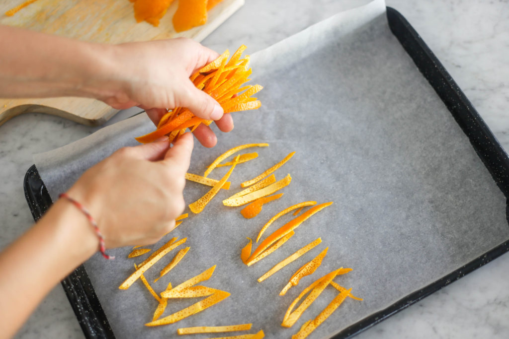 Lay your orange peel on baking paper