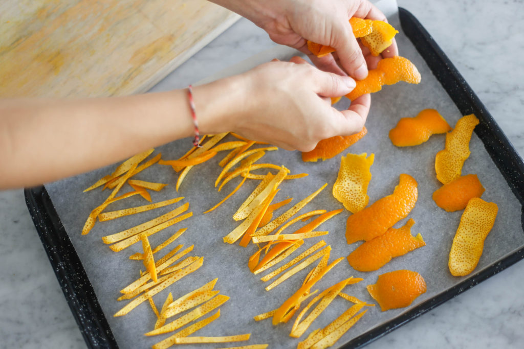 Lay your orange peel on baking paper