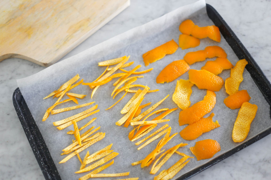 Lay your orange peel on baking paper