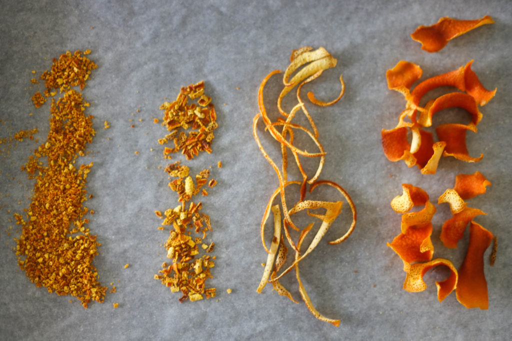 Ground orange peel, chopped orange peel, sliced orange peel, and dried orange peel pieces